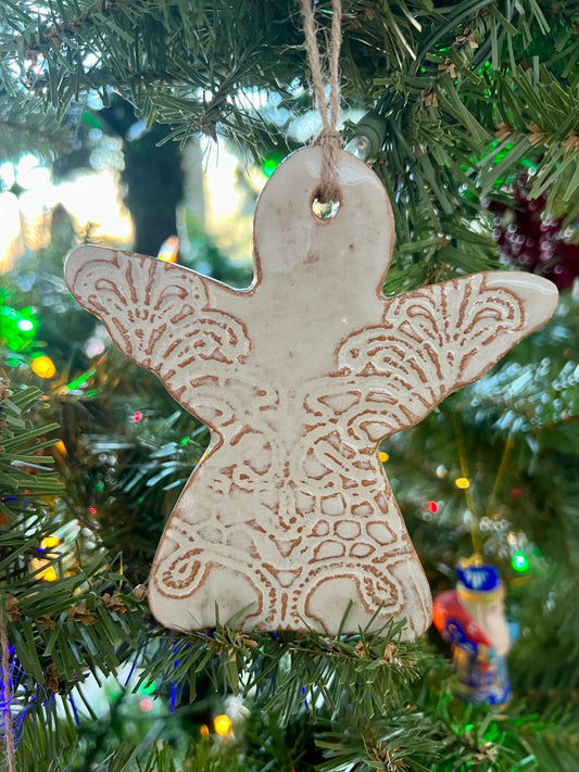 handmade ceramic ornaments come to us from a small-batch potter in Alabama, USA who employs women who have escaped domestic abuse, homelessness and sex trafficking.