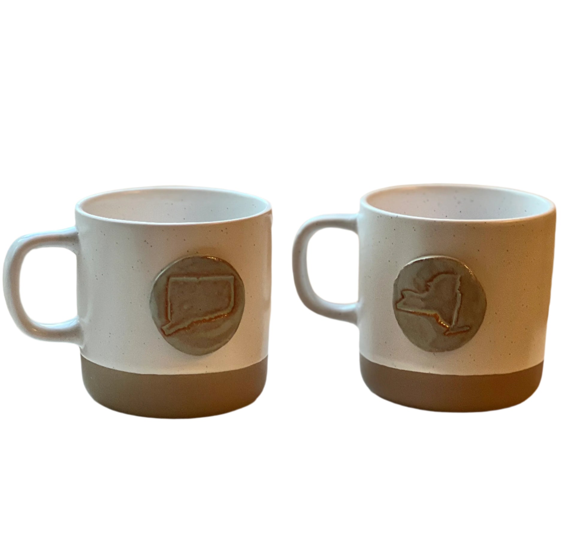 The Rooted Plow is proud to partner with an Alabama USA-based small batch pottery business that employs women who have escaped homelessness, sex-trafficking and domestic abuse.    These hand-made 10 ounce mugs boast medallions imprinted with the outlines of New York State and Connecticut. 
